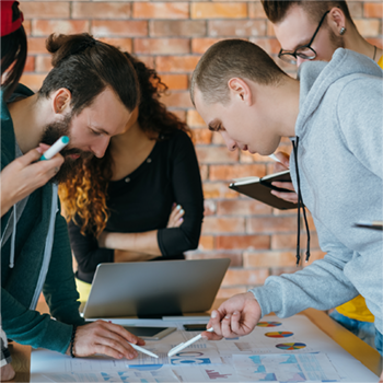 Team brainstorming around a table