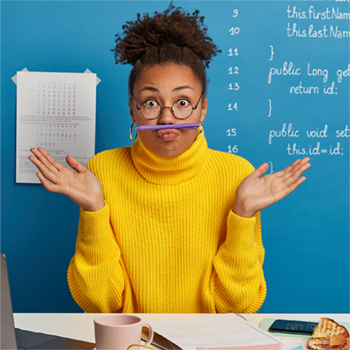 Colleague making a playful face at her desk